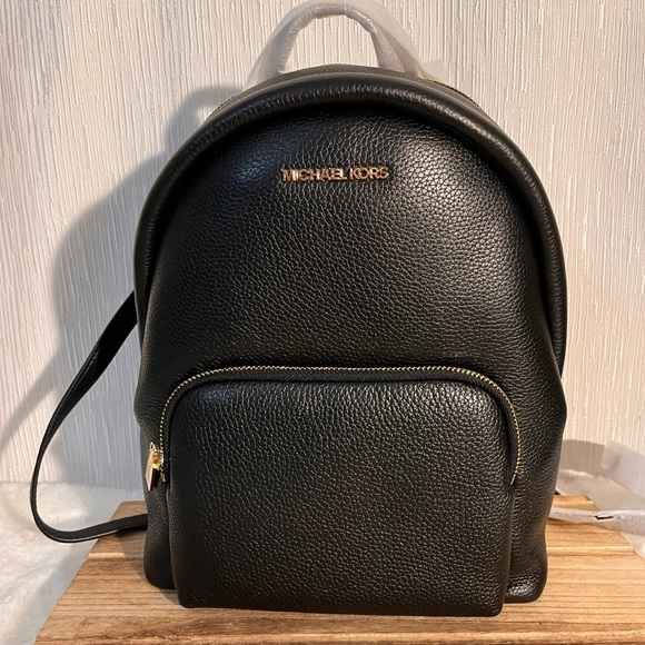 Michael Kors Women's Erin Medium
Pebbled Leather Backpack - Picture 1 of 6